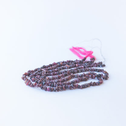 Genuine Ruby gemstone beads with organic chip cut, perfect for artisan jewellery designs.