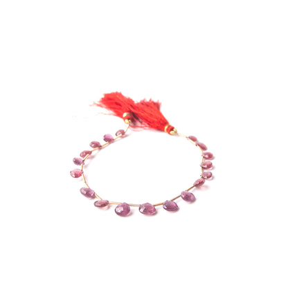 Genuine Ruby gemstone beads, 18 pieces totalling 39 carats, showcasing rich colour and fine clarity.