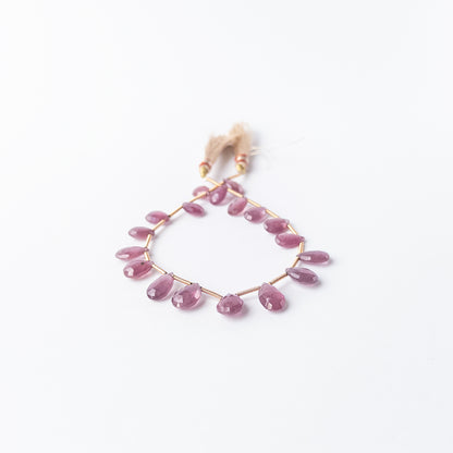 Ruby faceted briolette beads in rich red tones, genuine gemstone beads with brilliant sparkle.