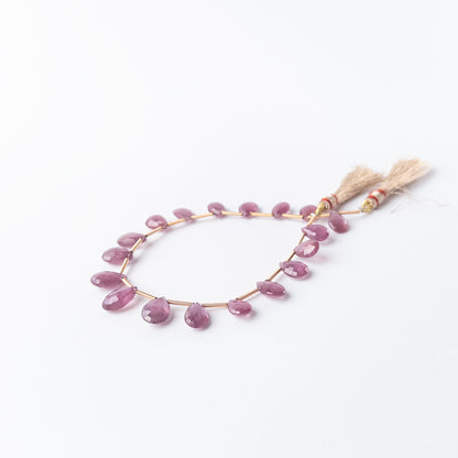 Faceted Ruby briolette beads with deep crimson hues, perfect gemstone beads for DIY jewellery making.