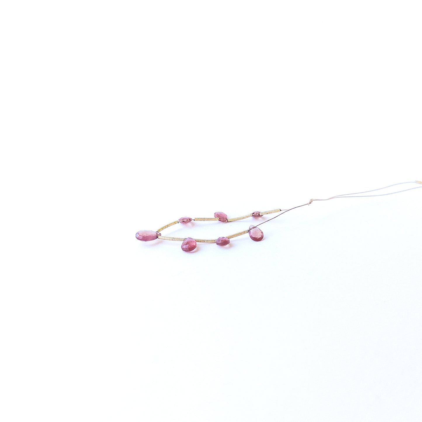 Authentic Ruby briolette gemstone beads with sparkling faceting, ideal for DIY jewellery and beadwork.