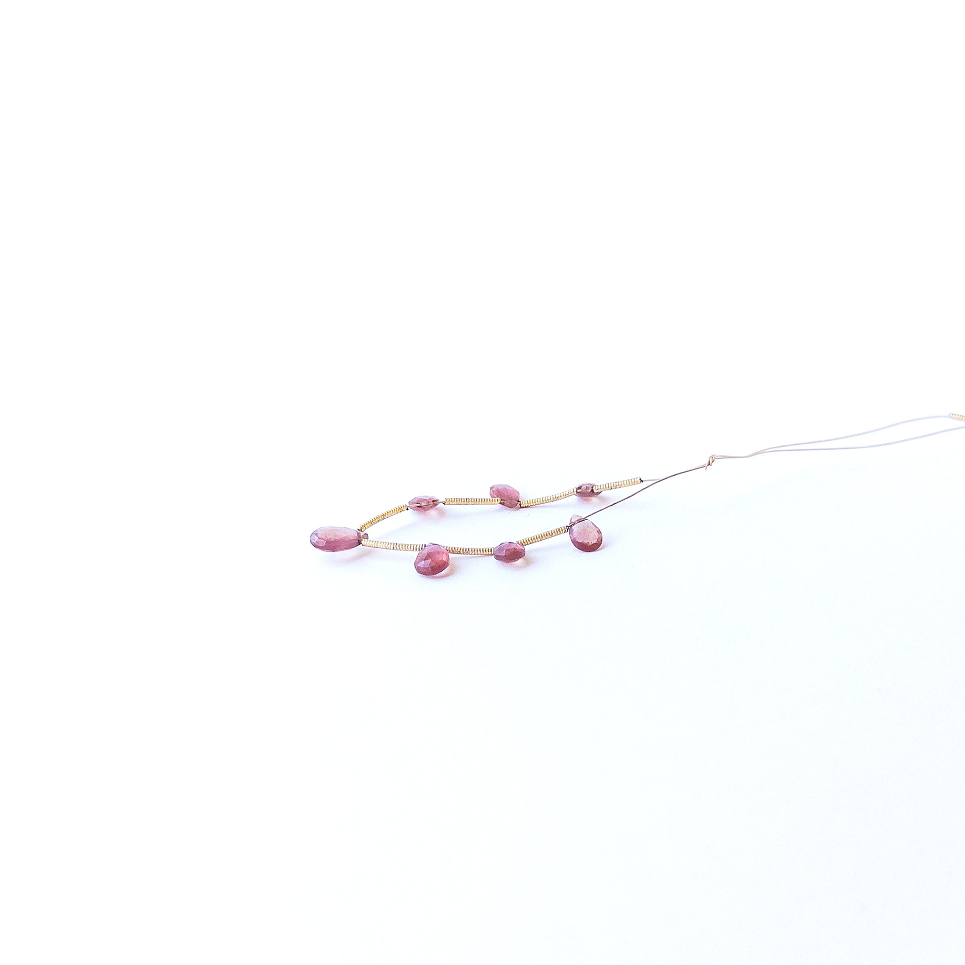 Authentic Ruby briolette gemstone beads with sparkling faceting, ideal for DIY jewellery and beadwork.