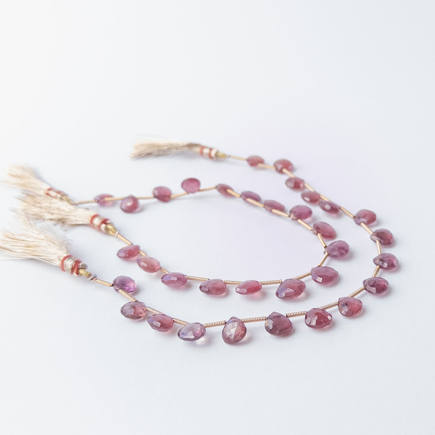 Faceted Ruby briolette beads with rich crimson hues, perfect gemstone beads for DIY jewellery making.