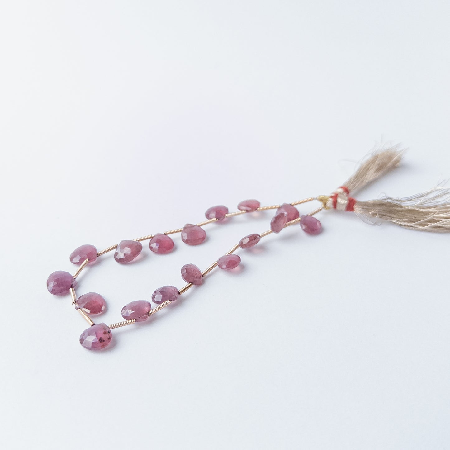 Sparkling Ruby faceted briolette beads, genuine gemstone beads ideal for handmade jewellery projects.