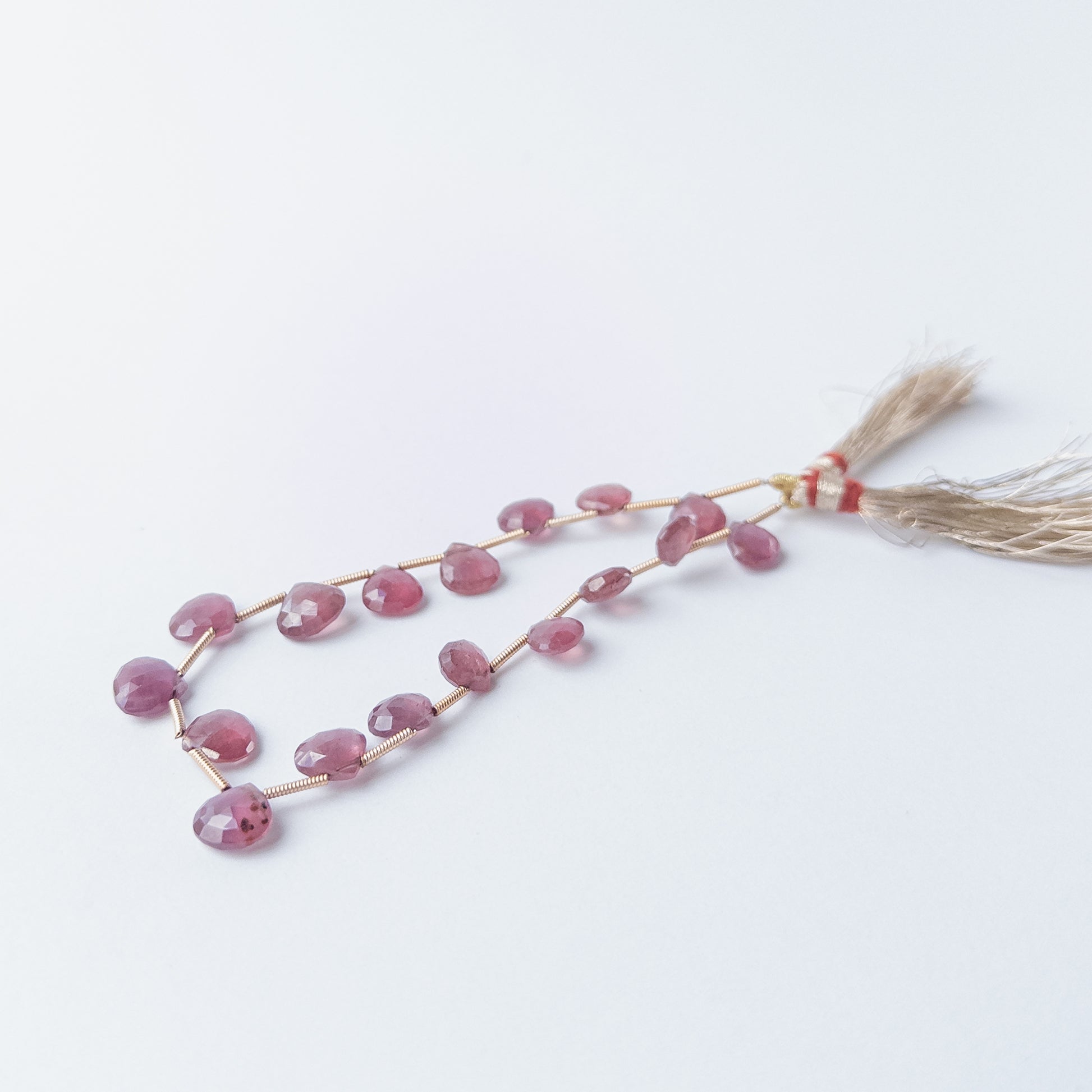 Sparkling Ruby faceted briolette beads, genuine gemstone beads ideal for handmade jewellery projects.