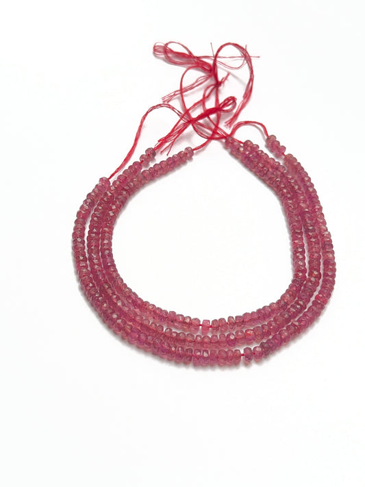 Bright ruby stone beads in faceted rondelle shape, showcasing shine and quality for handmade jewellery components.