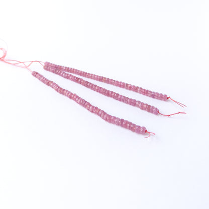 Ruby faceted rondelle beads with natural shine, perfect for DIY jewellery makers using authentic gemstone beads.
