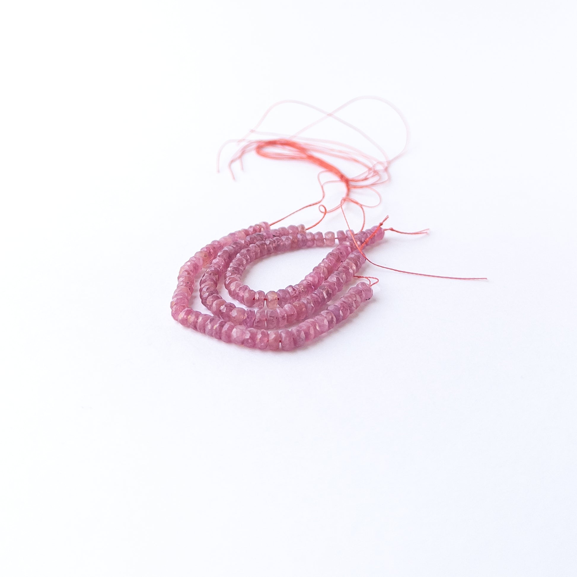 Authentic Ruby gemstone beads with sparkling faceted rondelle cut arranged neatly in a 10cm strand.