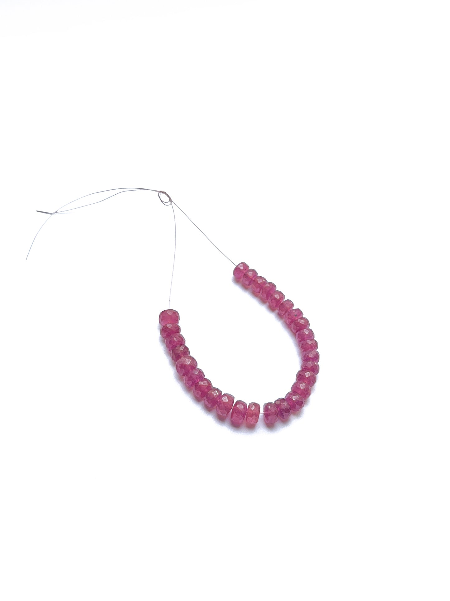 Ruby faceted rondelle beads with uniform 6–6.5mm sizing, offering radiant shine for elegant handmade jewellery designs.