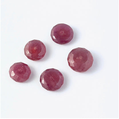 Close view of Ruby faceted rondelle beads showing cut, clarity and premium gemstone quality