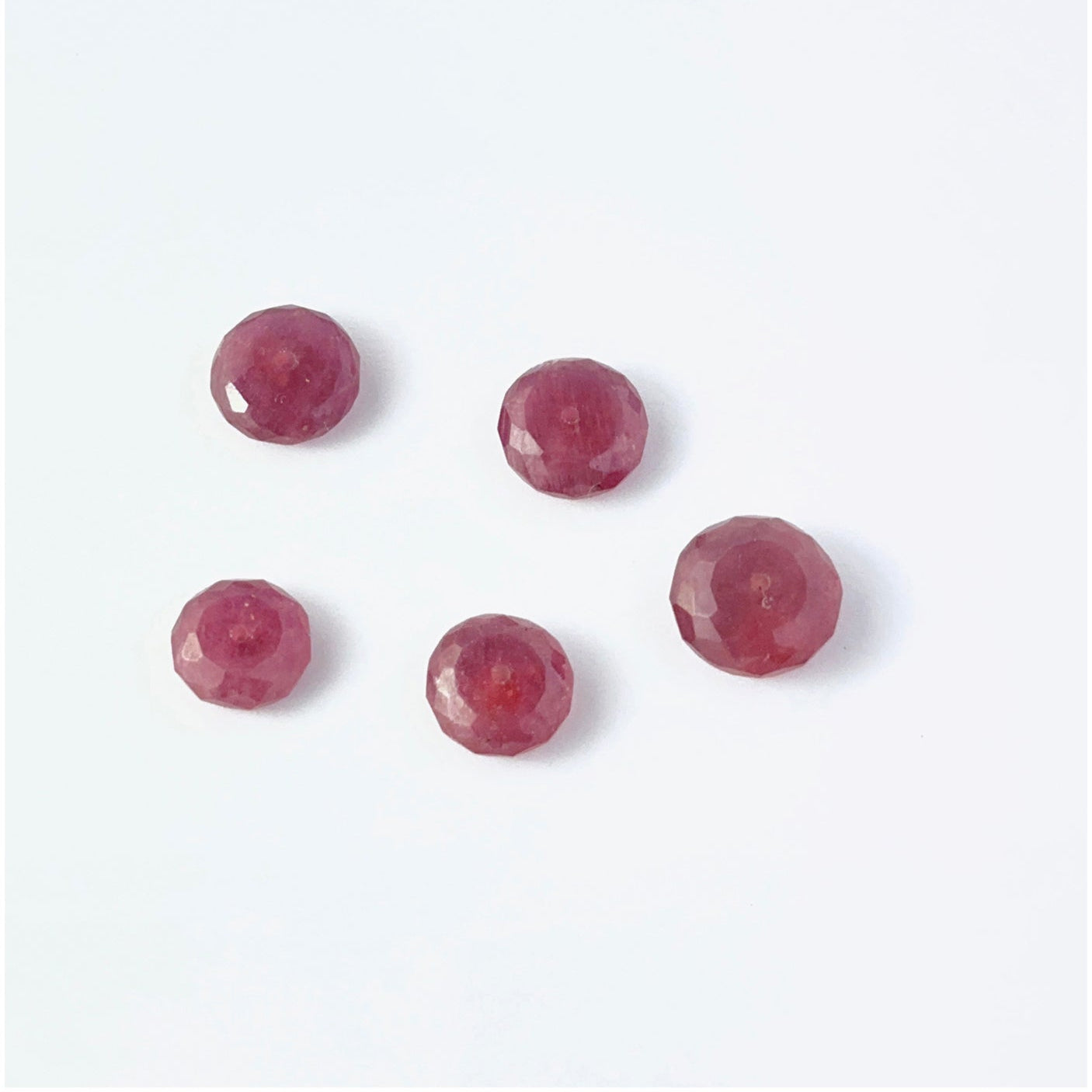 Ruby faceted rondelle beads showing cut, clarity and premium gemstone quality.