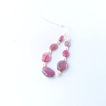 Eight baroque freshwater oval pearls 3.6–4.2mm with natural lustre and organic shapes.