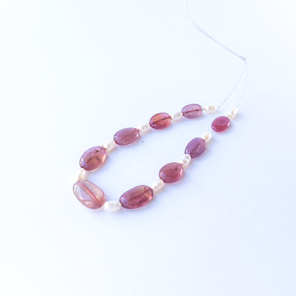 Ten baroque freshwater oval pearls around 4mm with natural lustre and organic shapes.
