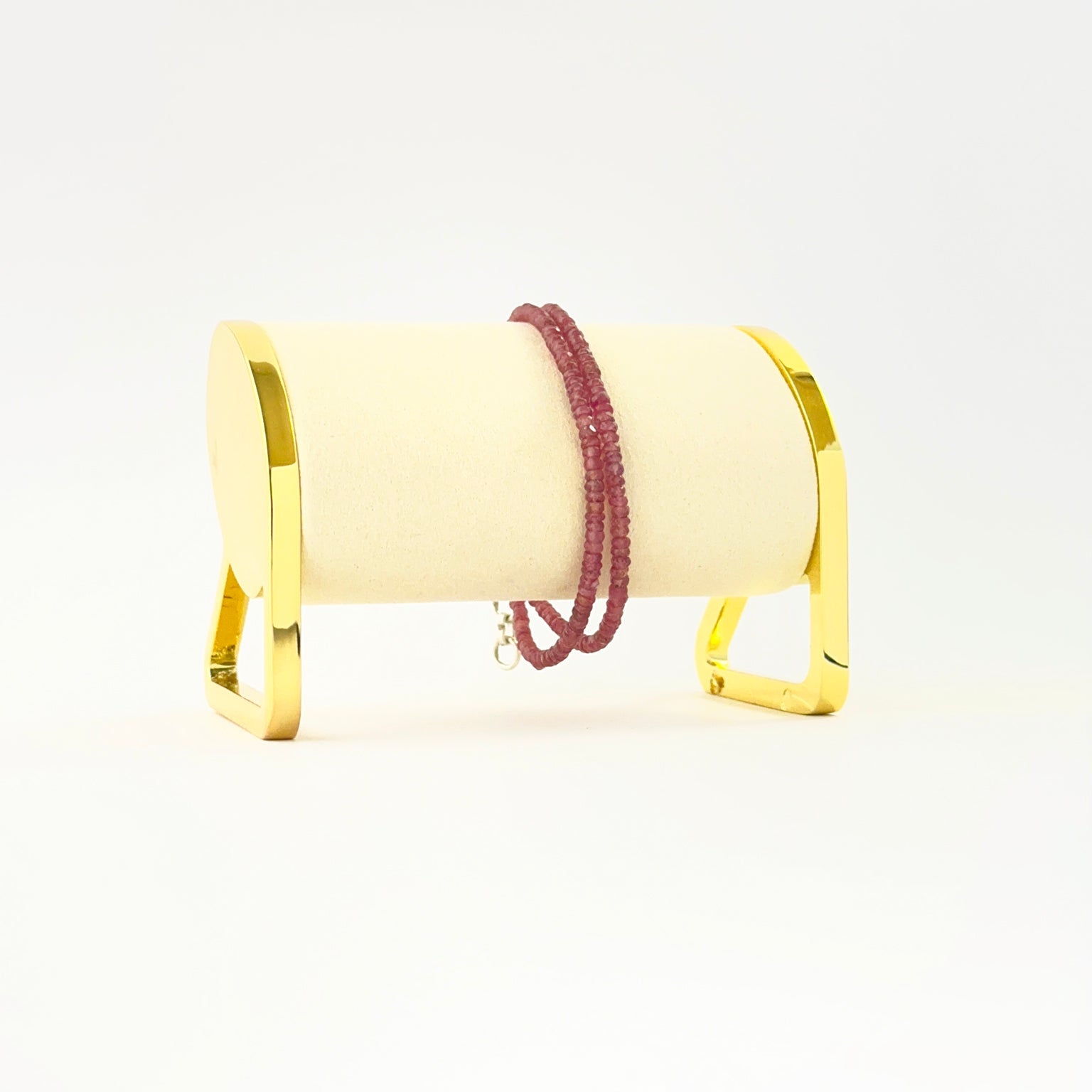 Two‑strand ruby bracelet featuring faceted rondelle 3–3.2mm beads in an 18cm adjustable design.