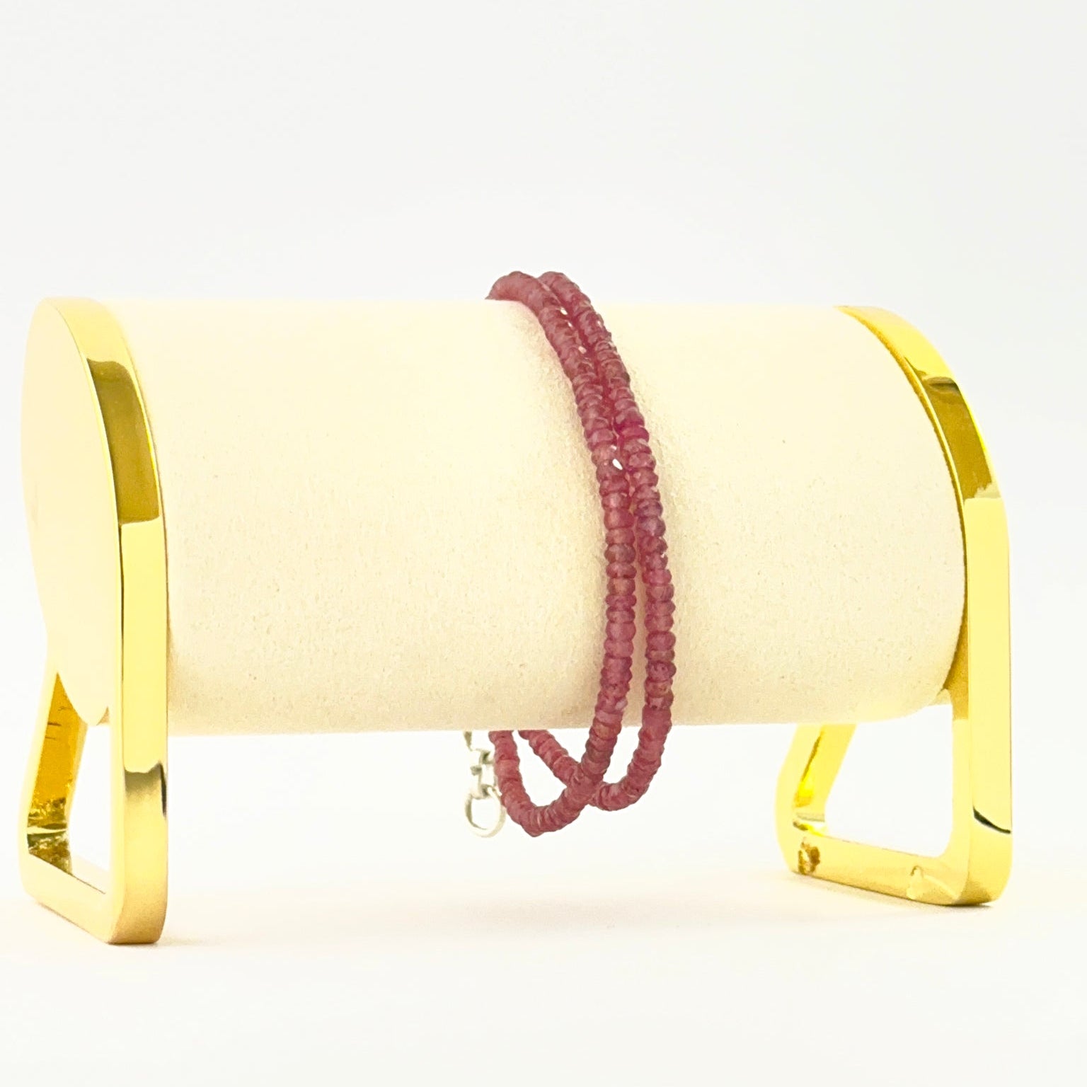 Layered ruby bracelet crafted with sparkling faceted rondelle beads.