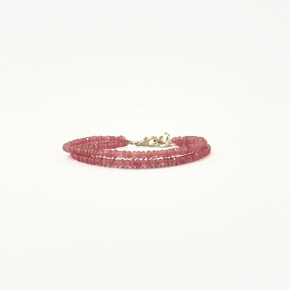 Elegant two‑strand ruby bracelet showcasing faceted 3–3.2mm rondelle beads.