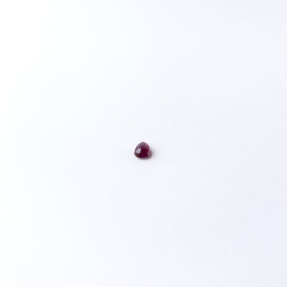 Genuine Ruby gemstone cabochon displaying rich red tone, smooth curves and premium handmade jewellery quality.