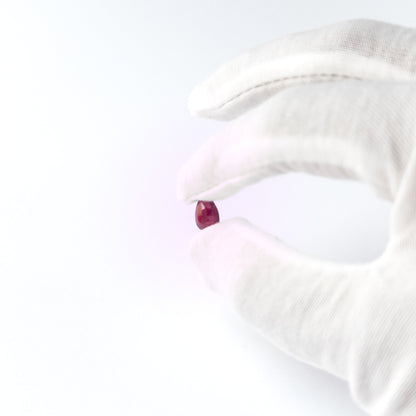 Handmade jewellery components featuring Ruby pear‑cut cabochon with vibrant red hue and refined shaping.