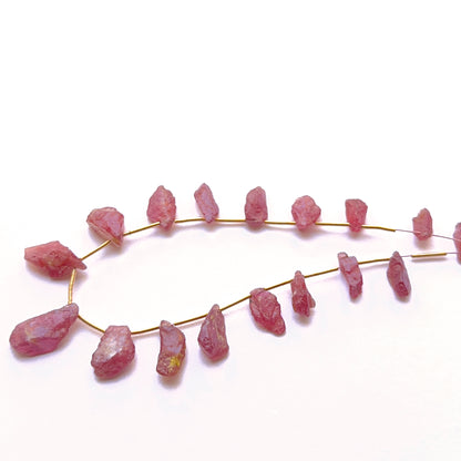 Handmade jewellery components featuring ruby rough pieces with bold character