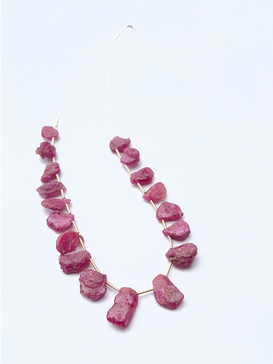 Ruby rough gemstone beads showing deep red tones and raw texture for handmade jewellery designs.
