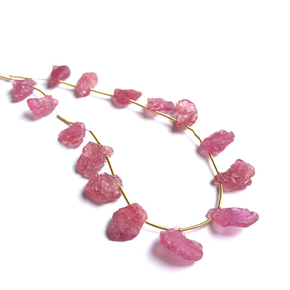 Close‑up of ruby rough beads highlighting their organic shape and rich colour for DIY jewellery making.