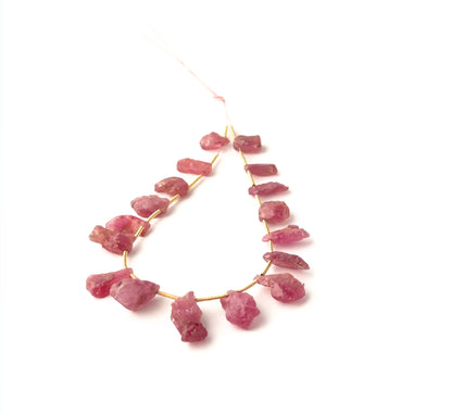 Genuine Ruby rough side‑drilled pieces, 9×6mm to 18×8mm, sold as 17 pieces totalling 75 carats for handmade jewellery.