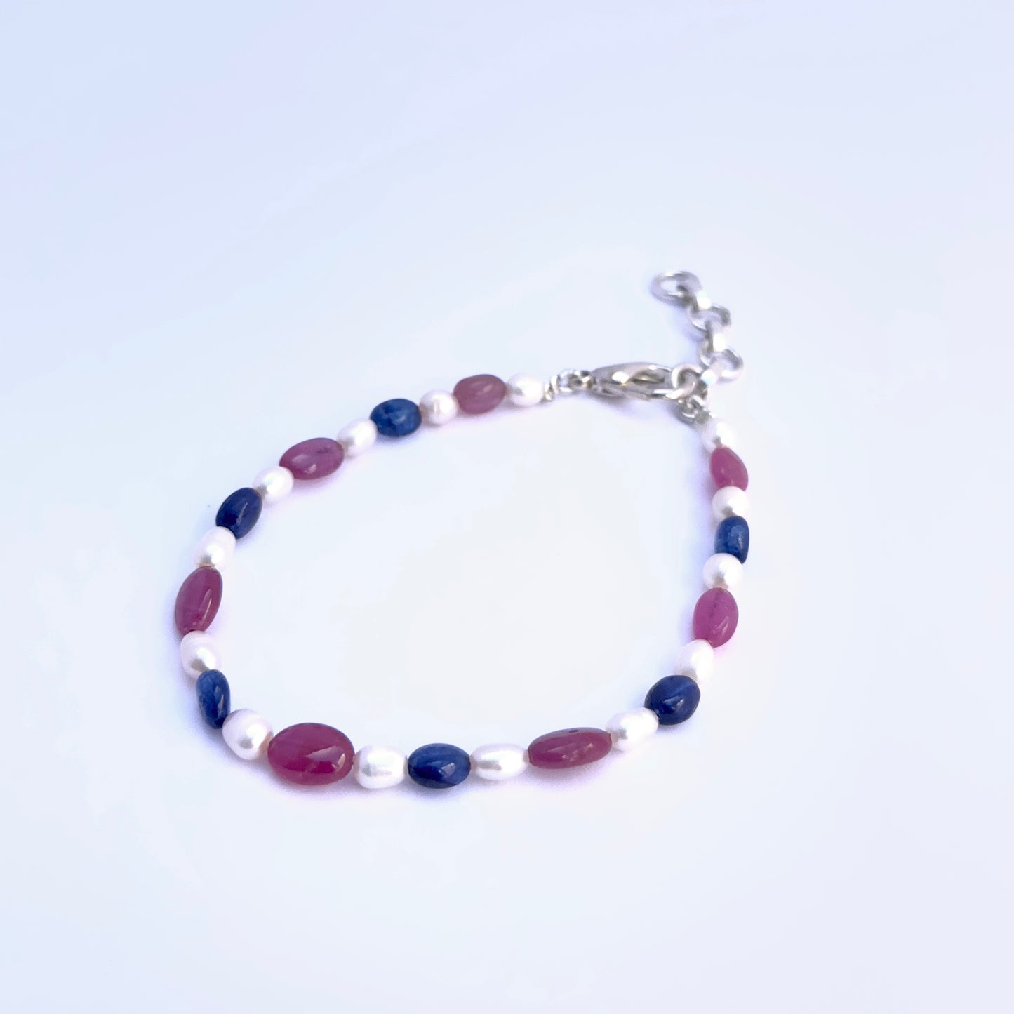 Elegant stone beads bracelet featuring 5–6mm Ruby, Sapphire, and Freshwater Pearls.