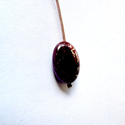 Single Ruby bead with 0.5mm hole, ideal for pendants and statement jewellery.
