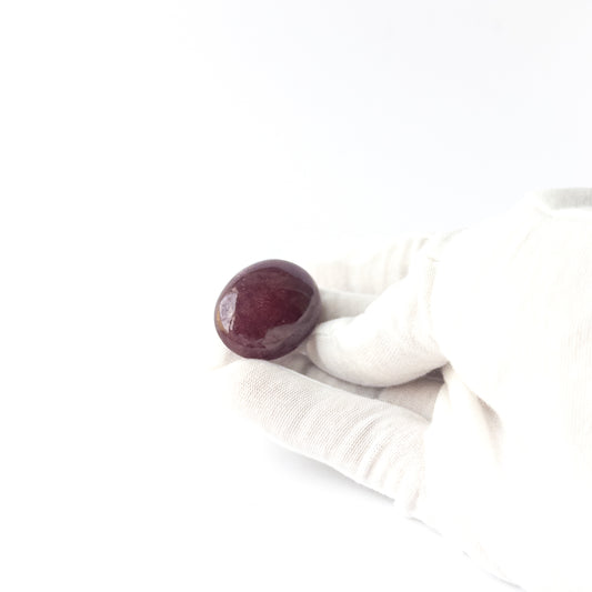 Genuine Ruby stone cabochon displaying rich red tone, glossy surface and premium handmade jewellery quality.