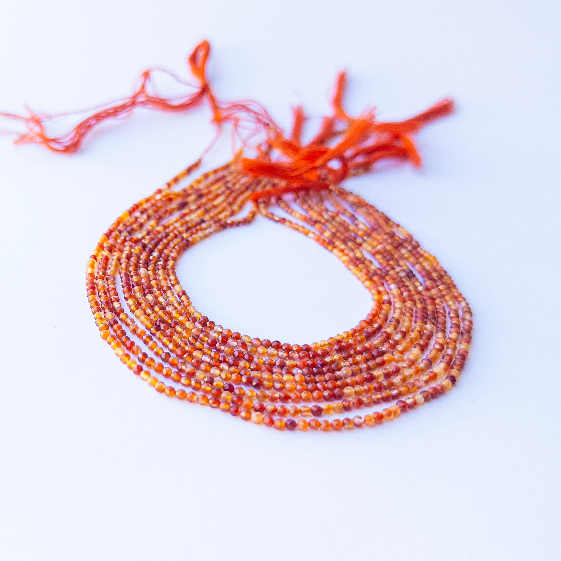 Rutile faceted rondelle beads in 2.4mm showing golden needle inclusions, ideal for genuine gemstone beads and handmade jewellery components.