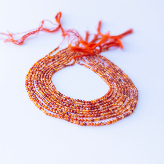 Rutile faceted rondelle beads in 2.4mm showing golden needle inclusions, ideal for genuine gemstone beads and handmade jewellery components.