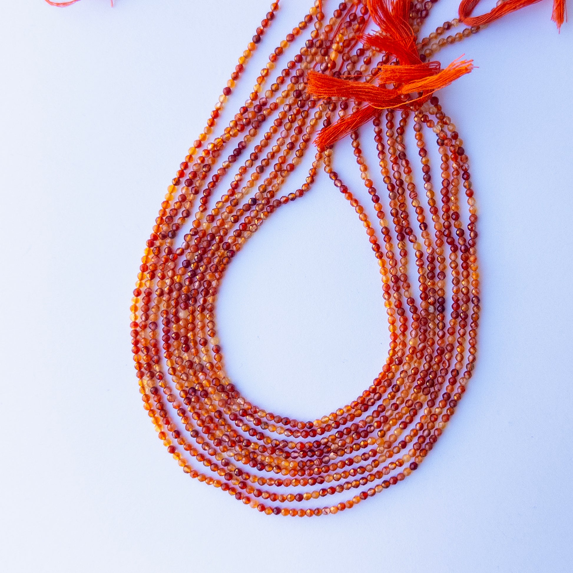 Rutile faceted rondelle beads with warm golden tones, perfect for handmade jewellery components and artisan beadwork.