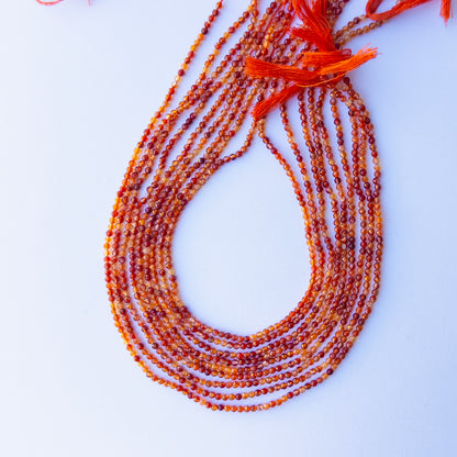 Rutile faceted rondelle beads with warm golden tones, perfect for handmade jewellery components and artisan beadwork.