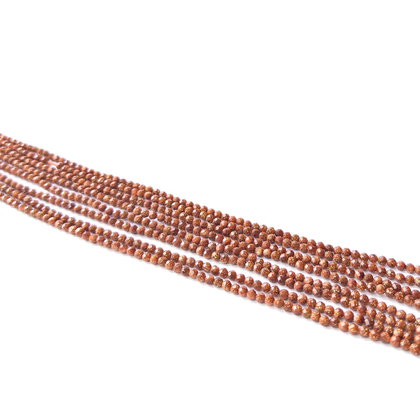 Handmade jewellery components featuring natural Sandstone faceted rondelles, highlighting their shimmer, colour, and refined finish.