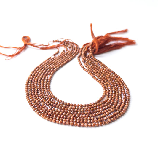 Sandstone faceted rondelle beads in 3–3.2mm size on a 31cm strand, showcasing genuine gemstone sparkle for handmade jewellery.
