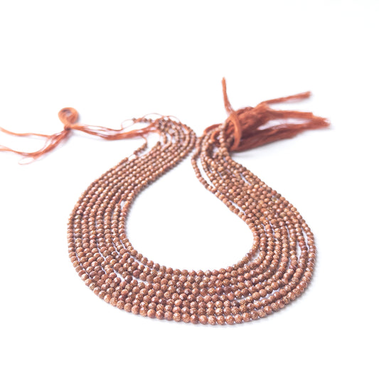 Sandstone faceted rondelle beads in 3–3.2mm size on a 31cm strand, showcasing genuine gemstone sparkle for handmade jewellery.
