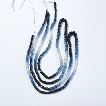 Premium shaded sapphire beads in rondelle cut,  aligned in a luminous 40cm arrangement.