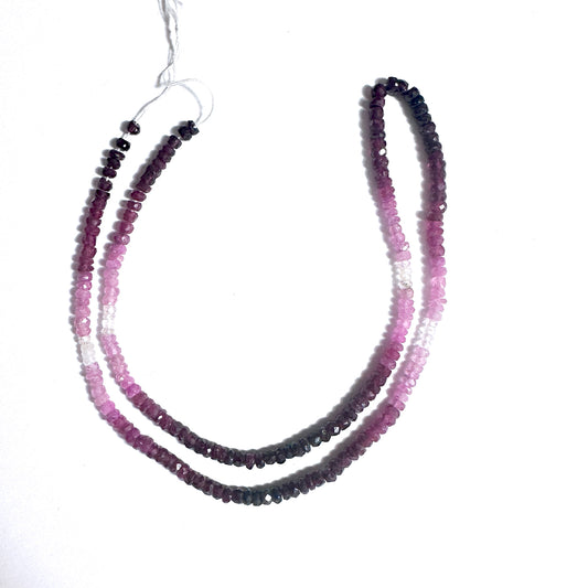 Shaded Ruby rondelle beads with faceted cut sparkle across a 40cm strand of 49 carats.