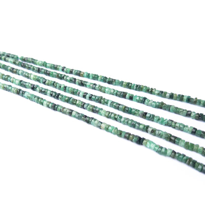 Handmade jewellery components featuring Shaded Emerald Heishi beads in elegant green hues.