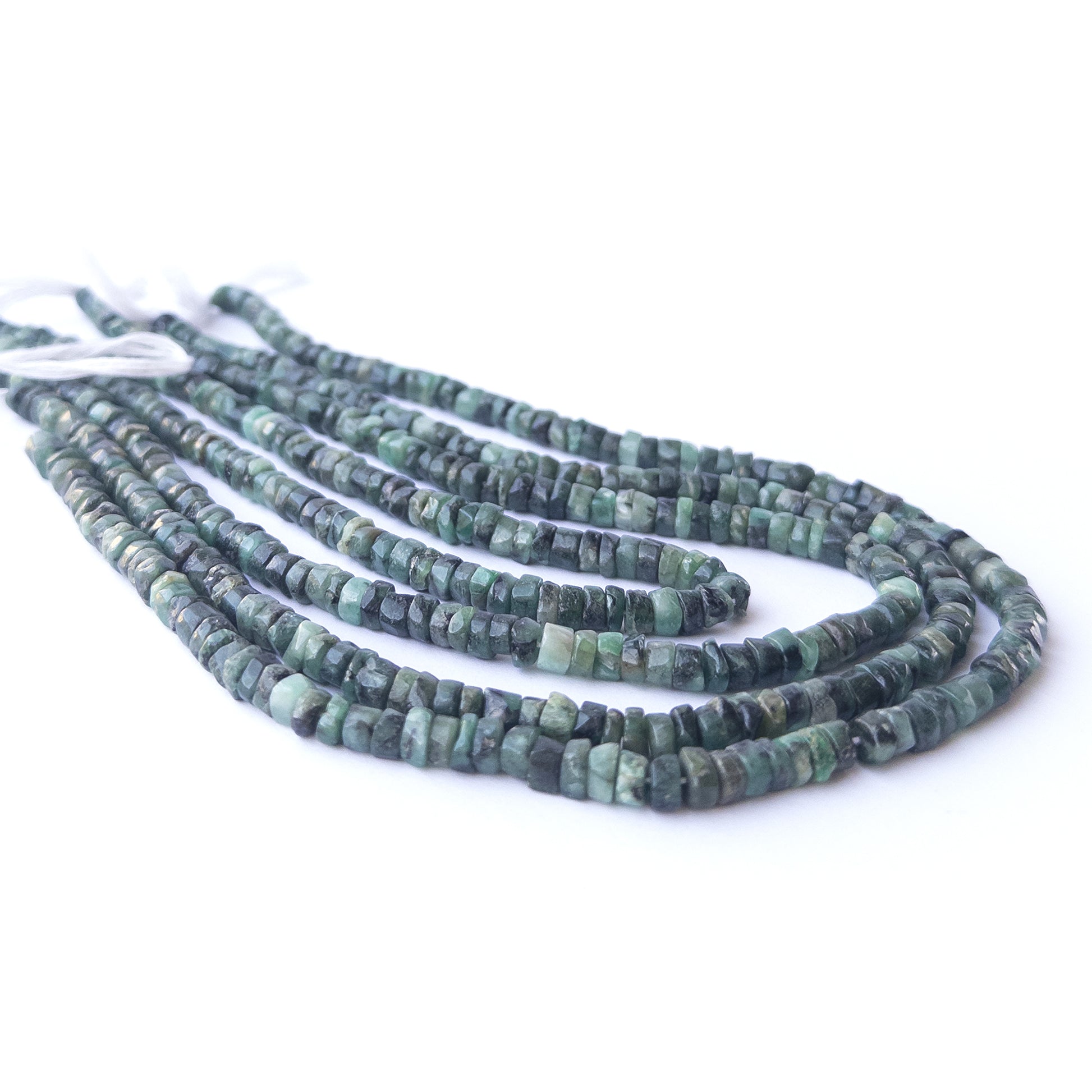 Shaded Emerald wheel beads displaying rich green gradients and high‑quality craftsmanship.