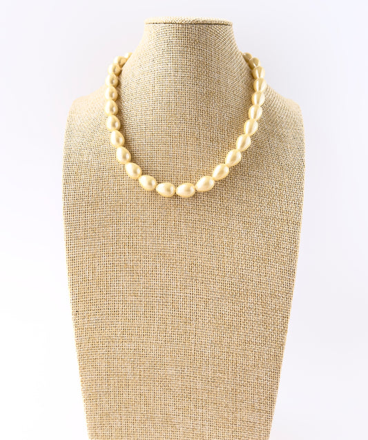 Shell Pearls smooth oval 10.3mm beads arranged in a 39cm necklace strand with a lustrous finish for elegant handmade jewellery.