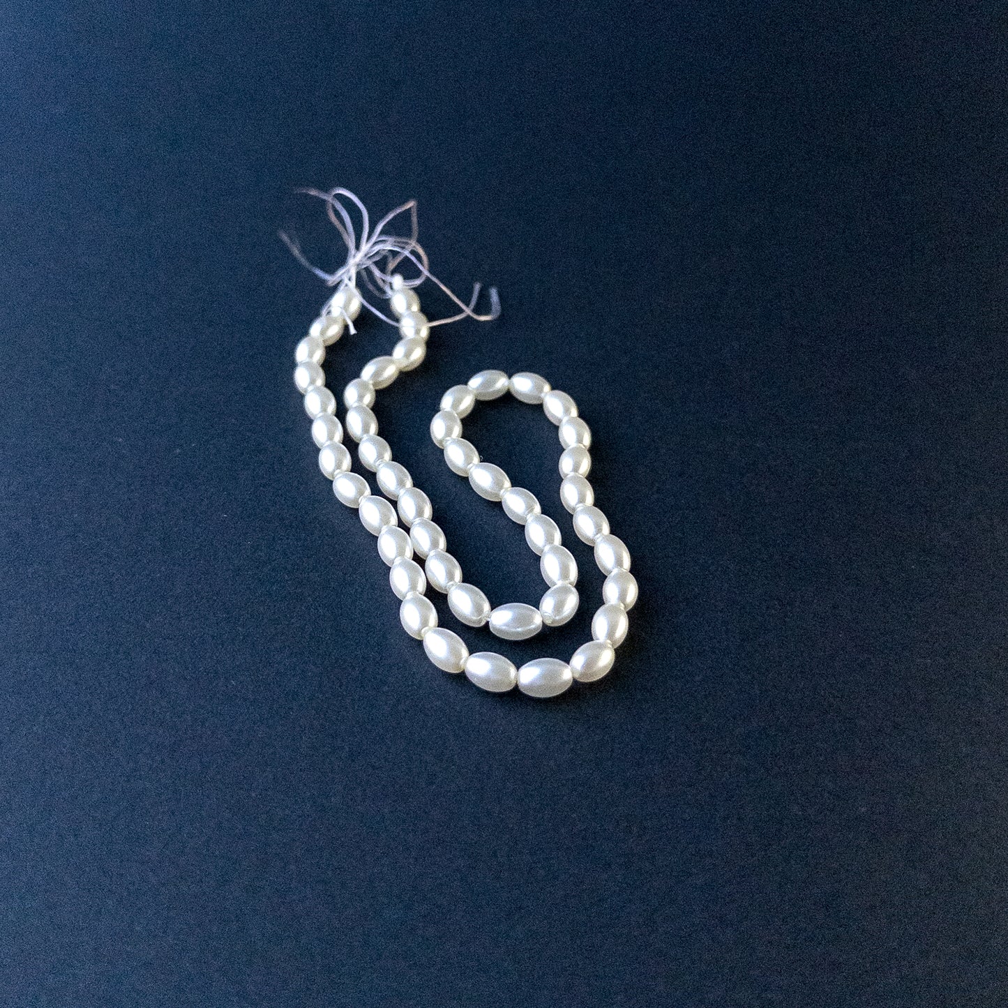 Authentic Shell Pearl smooth oval beads with creamy tones ideal for DIY jewellery making.