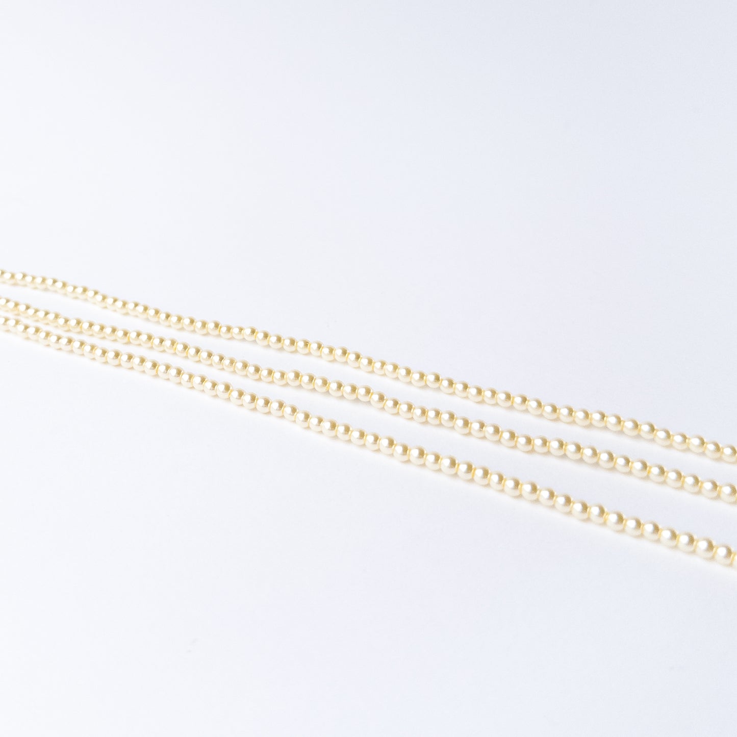Smooth round Shell Pearl stone beads with refined lustre for premium jewellery crafting.