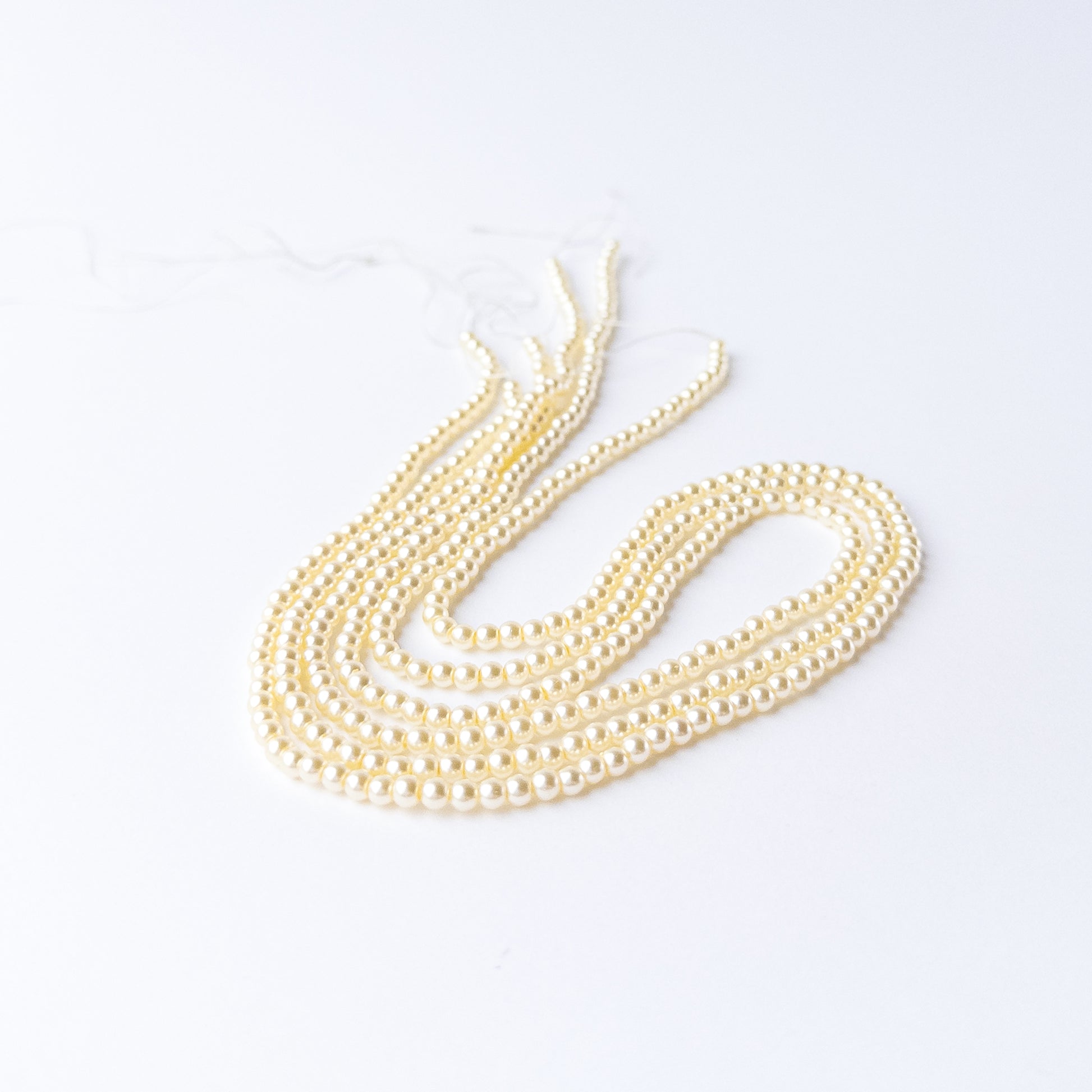 High quality Shell Pearl beads arranged neatly for artisan jewellery and beadwork projects.