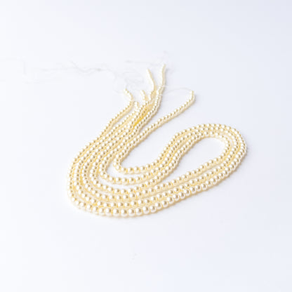 High quality Shell Pearl beads arranged neatly for artisan jewellery and beadwork projects.