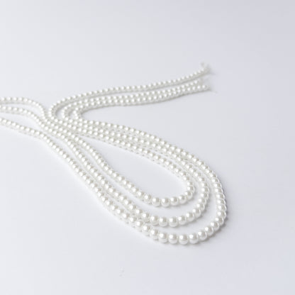 High-quality Shell Pearl beads arranged neatly for artisan jewellery and beadwork projects.