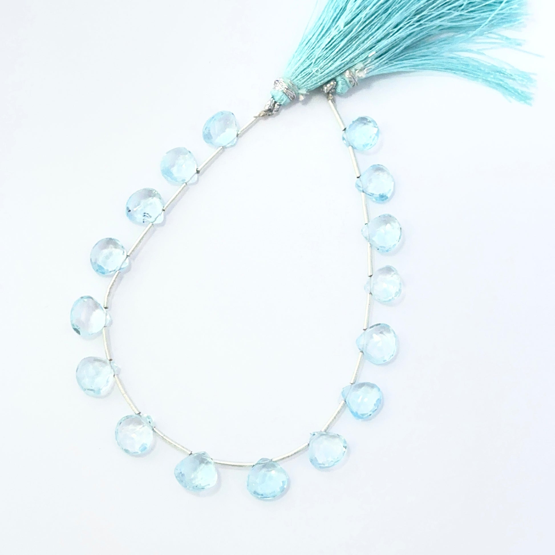 Sky Blue Topaz 8–8.5mm teardrop beads displaying vivid colour and handmade jewellery components.