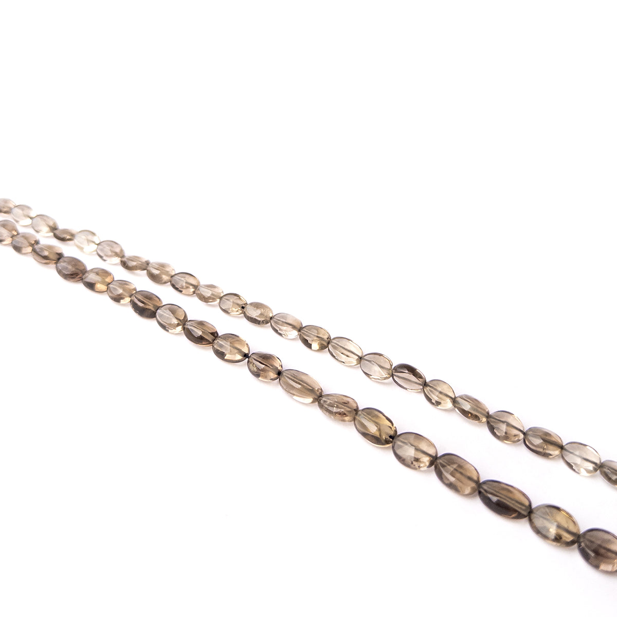 Genuine Smoky Quartz gemstone beads arranged on a 23cm strand with varied sizes and refined faceted finishes.