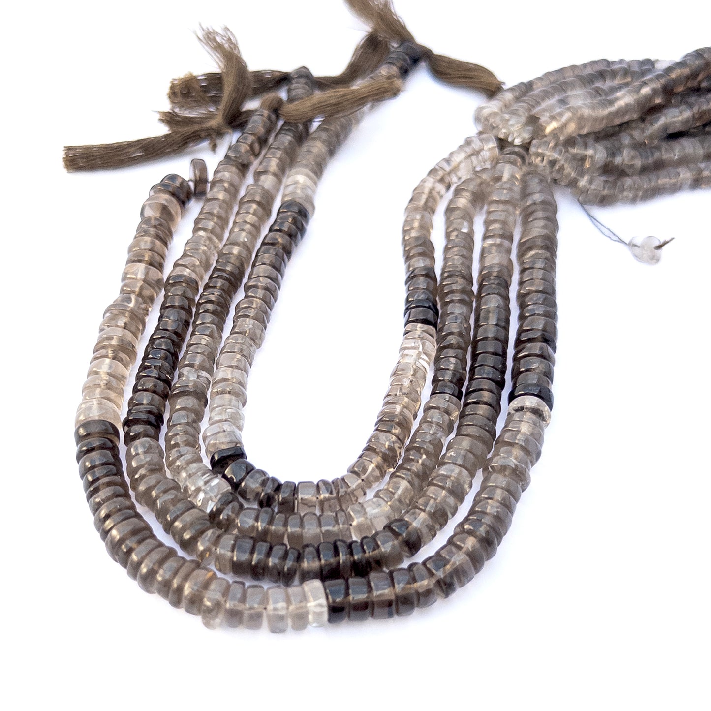 Smoky Quartz smooth rondelle gemstone beads arranged in a strand, showcasing warm earthy tones and polished shine.