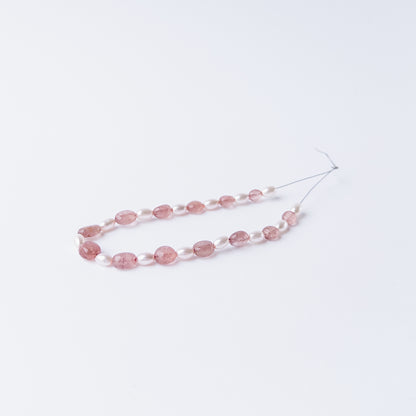 Smooth oval Strawberry Quartz and Shell Pearl stone beads with refined shine for jewellery crafting.